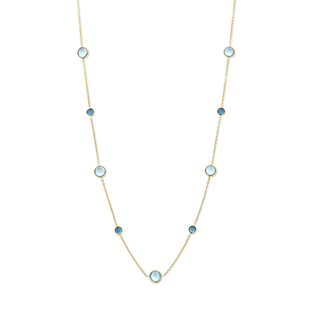 De Van der Kooij Collectie collier blauw topaas en london blue topaas is een 14K geelgouden dames ketting met afwisselend kleine blauw en london blue topaas stenen over de elegante ketting van 42-45 cm.