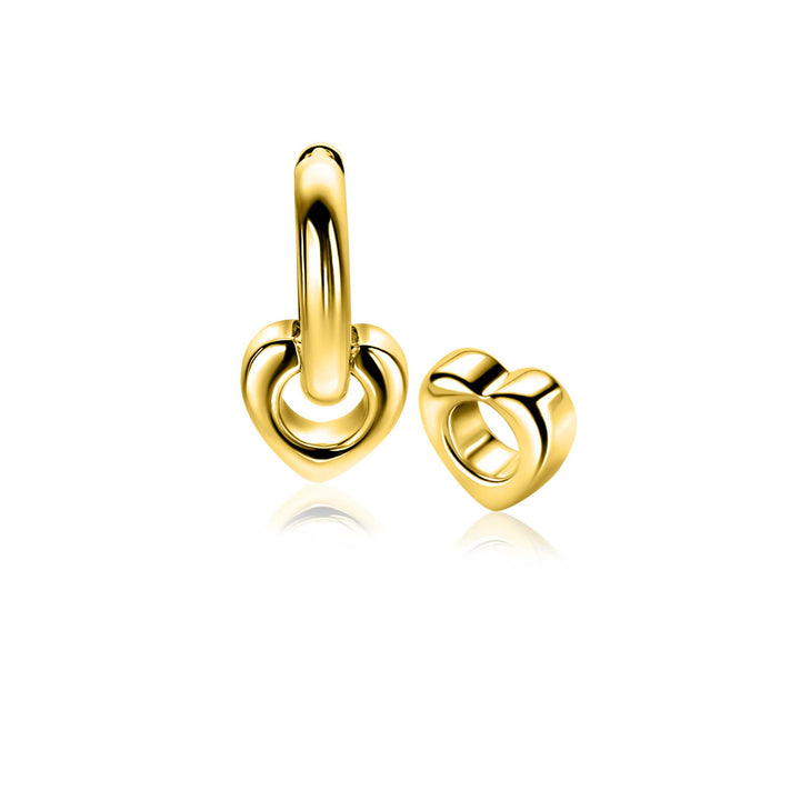 Een paar Zinzi oorbedels zilver verguld (model ZICH2695G) met hartvormige motieven, afgebeeld op een witte achtergrond. Eén oorbel staat rechtop met een hoepel, de andere toont het hart vanuit een andere hoek. Merk: Zinzi.