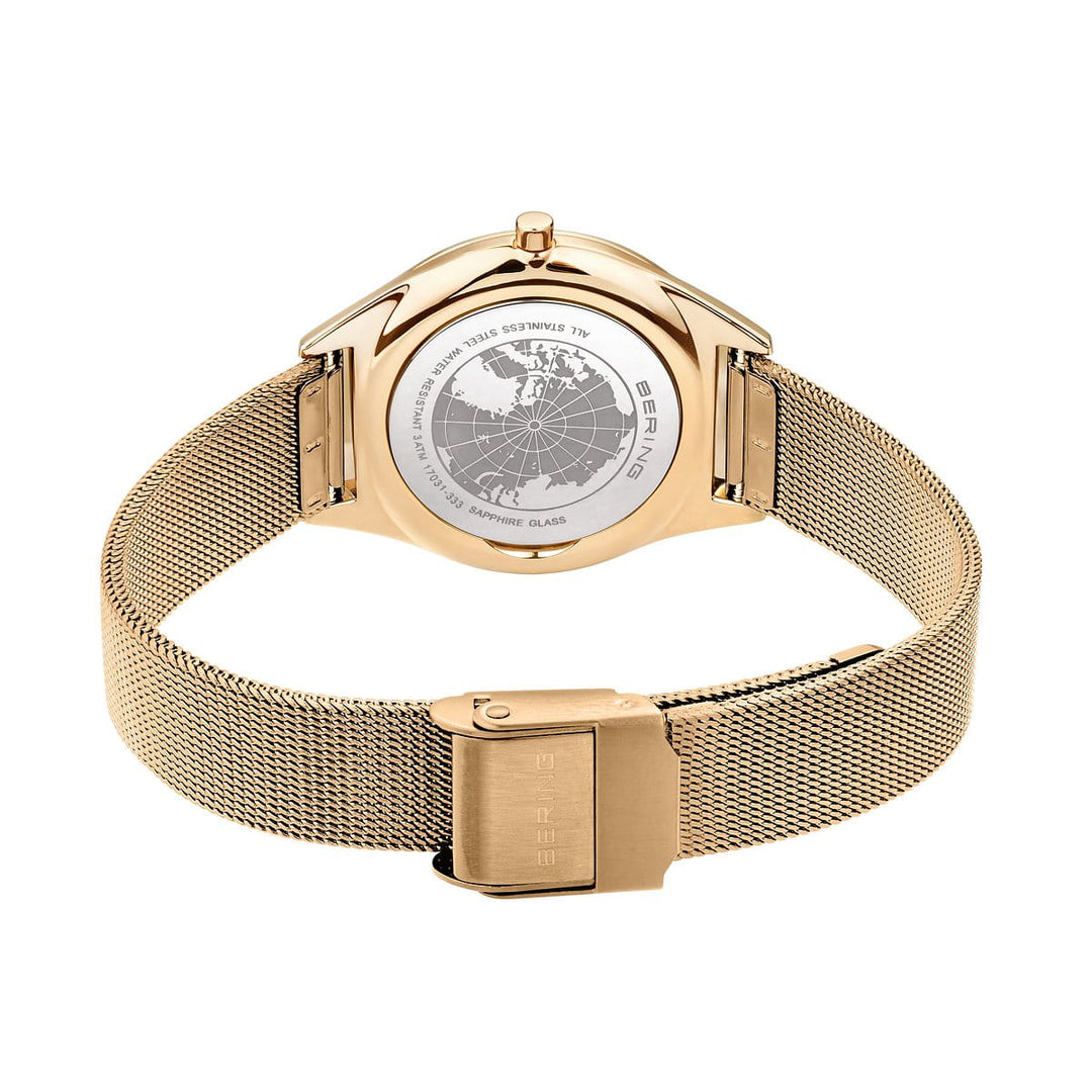 Het Bering 17031-333 dameshorloge heeft een gouden mesh band en een wereldkaart gegraveerd op de achterkant van de kast. De merksluiting voegt elegantie toe en het beschikt over een quartz uurwerk en saffierglas voor stijl en duurzaamheid.