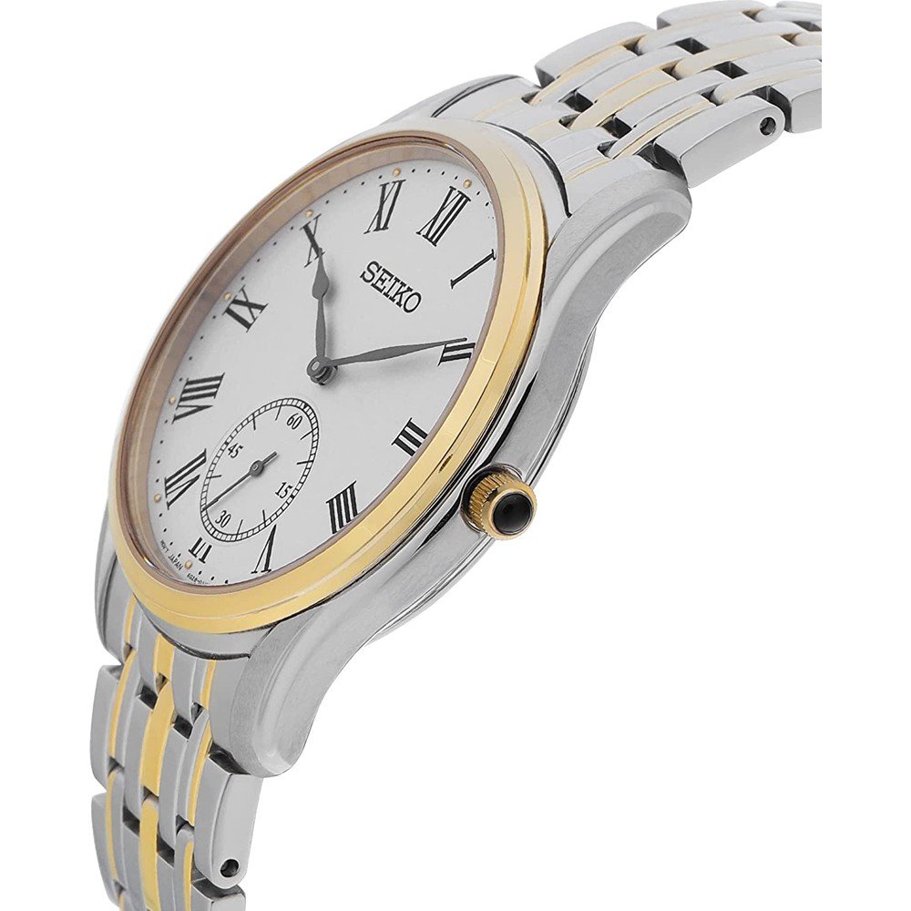 Het Seiko SRK048P1 herenhorloge heeft een witte wijzerplaat met Romeinse cijfers, zwarte wijzers en een kleine secondewijzerplaat op 6. Het horloge heeft een stijlvolle tweekleurige gouden en zilveren metalen band en is afgewerkt met een elegante gouden lunette op de quartz-aangedreven kast.