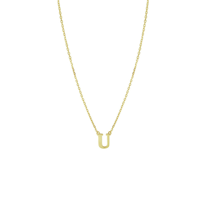 De Gouden dames ketting letter 14K van Van der Kooij Collectie heeft een delicate 14k goud anker collier met een gepersonaliseerde "U" hanger, perfect als dames cadeau en stijlvol gepresenteerd op een witte achtergrond.