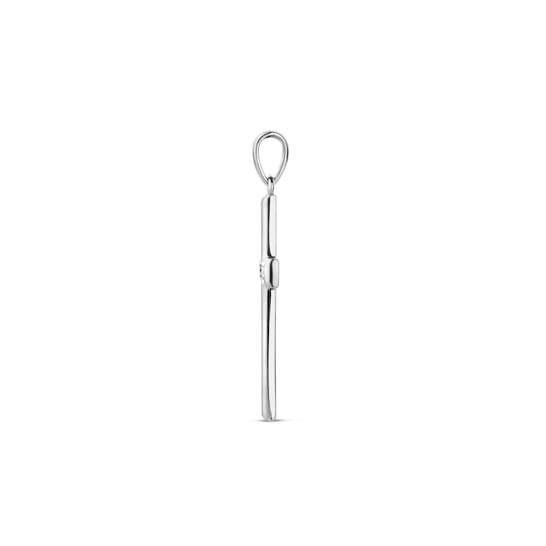 De hanger kruis zirkonia zilver gerhodineerd van Van der Kooij Collectie is een slanke, verticale hanger met een minimalistisch gerhodineerd zilveren design en een klein lusje voor bevestiging aan je ketting.