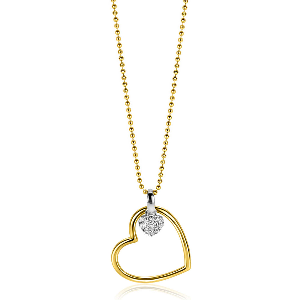 De Zinzi ketting ZIC2621 is een tweekleurige schakelketting met een gouden open harthanger en een zilveren, met diamanten bezette hartbedel, geïnspireerd op de elegante stijl van Zinzi. Verstelbare lengte: 45-48 cm.