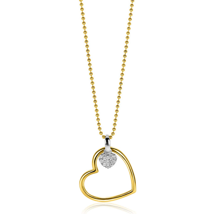De Zinzi ketting ZIC2621 is een tweekleurige schakelketting met een gouden open harthanger en een zilveren, met diamanten bezette hartbedel, geïnspireerd op de elegante stijl van Zinzi. Verstelbare lengte: 45-48 cm.
