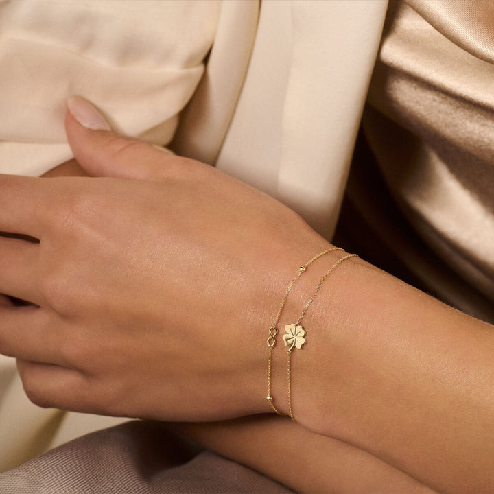 Goldarmband Damen Unendlichkeit und Kugeln 14K