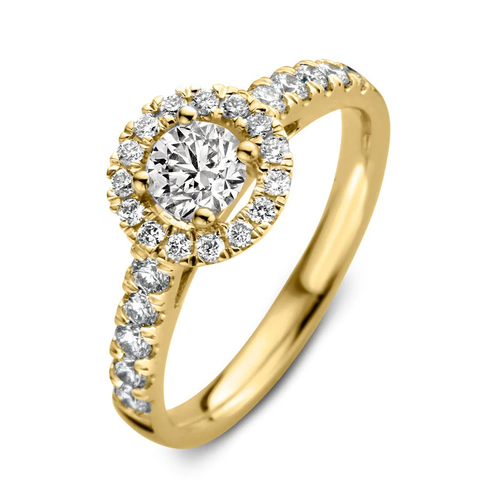 Ring aus Gelbgold mit rundem Zirkonia in der Mitte und umlaufendem Pavé aus kleinen Zirkoniasteinen