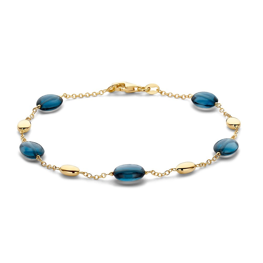 Gelbgoldene Armband mit blauen Topasen, 19 cm lang, 7 mm breit, mit ovalen und runden Elementen