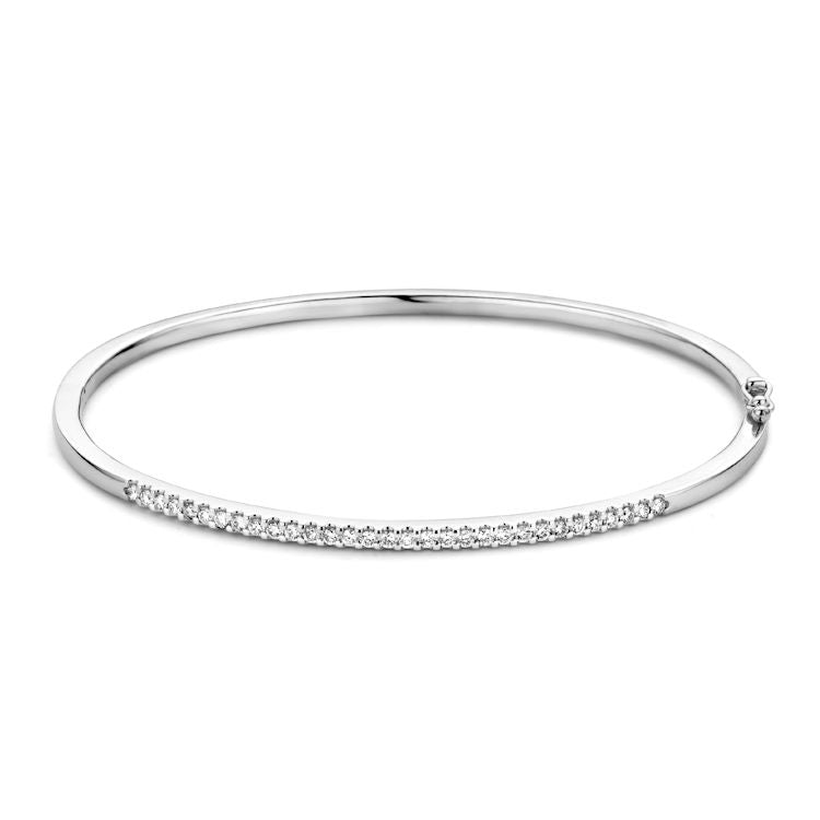 Schmale, gerhodinierte Slavenarmband aus Weißgold mit 31 Brillanten und feiner, glatter Oberfläche