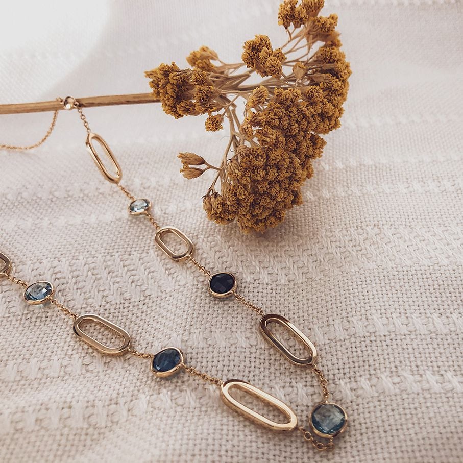 Gelbgoldcollier mit ovalen Gliedern und blauem Topas & London Blue Topas – 14 Karat