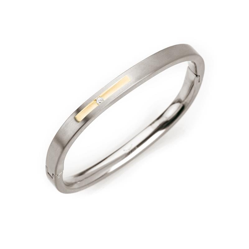 Bicolor Armband aus Titan mit glänzender Oberfläche und goldfarbener Einlage