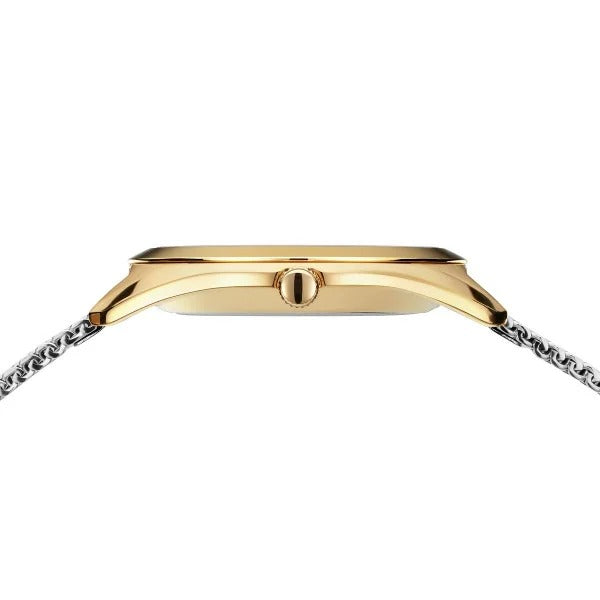 Zijaanzicht van de Bering 17331-010 dameshorloge, met een slanke gouden kast, ronde kroon en zilverkleurige metalen band. De wijzerplaat is verborgen; duurzaam saffierglas verhoogt de kwaliteit.