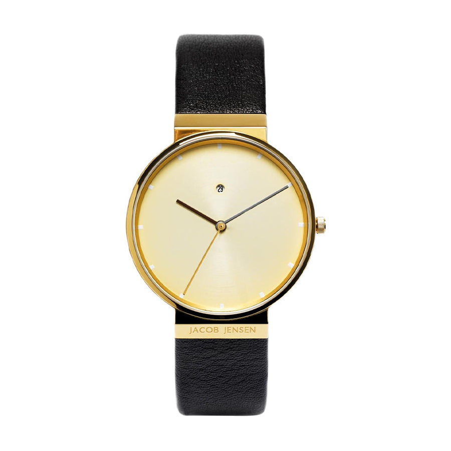 Uhr mit goldfarbenem Gehäuse, beigem Zifferblatt und schwarzem Lederarmband