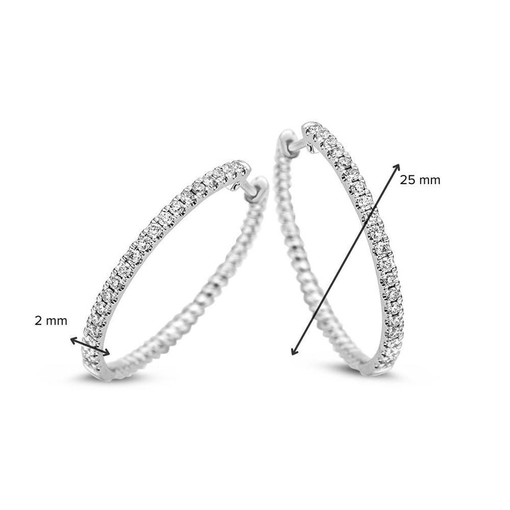 Witgouden oorringen met 0.48 crt diamant – 14 karaat 0,48 crt.