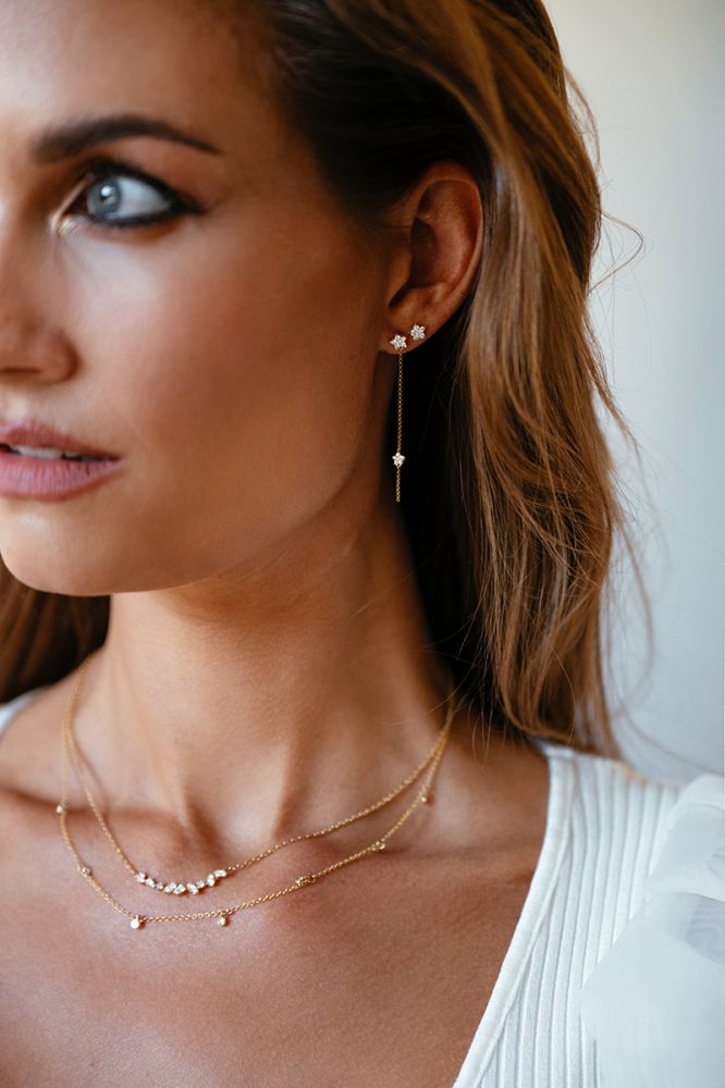 Brillante Ohrstecker aus Gelbgold in Sternform mit 0,16 ct Diamant