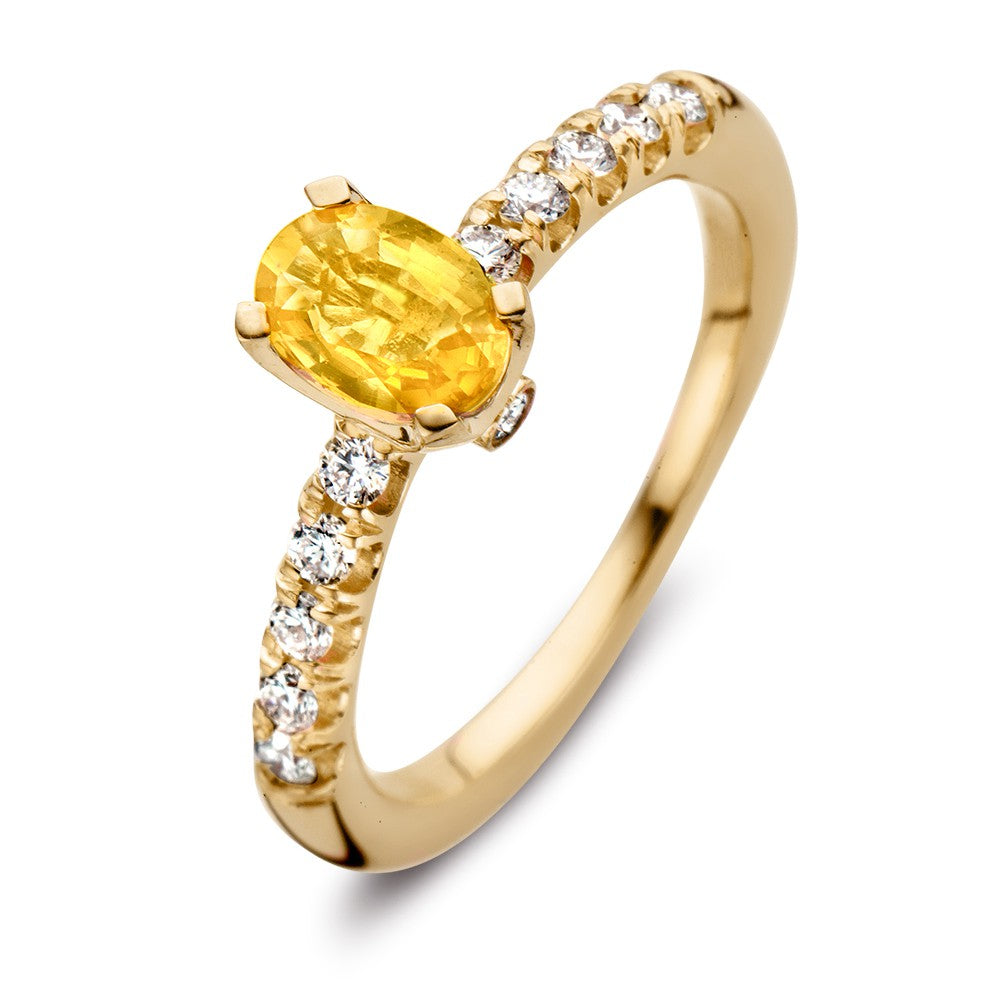 Luxe Ring aus 18kt Gelbgold mit ovalem gelbem Saphir und 0,54 ct Brillanten