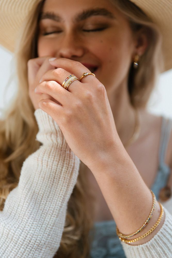 Damenring aus 14 Karat Bicolor-Gold mit Diamant im Brillantschliff