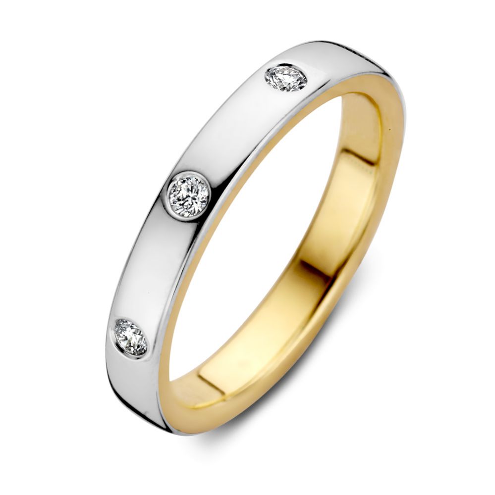 Bicolor Ring aus Gold und Silber mit drei Brillanten von je 0,10 ct