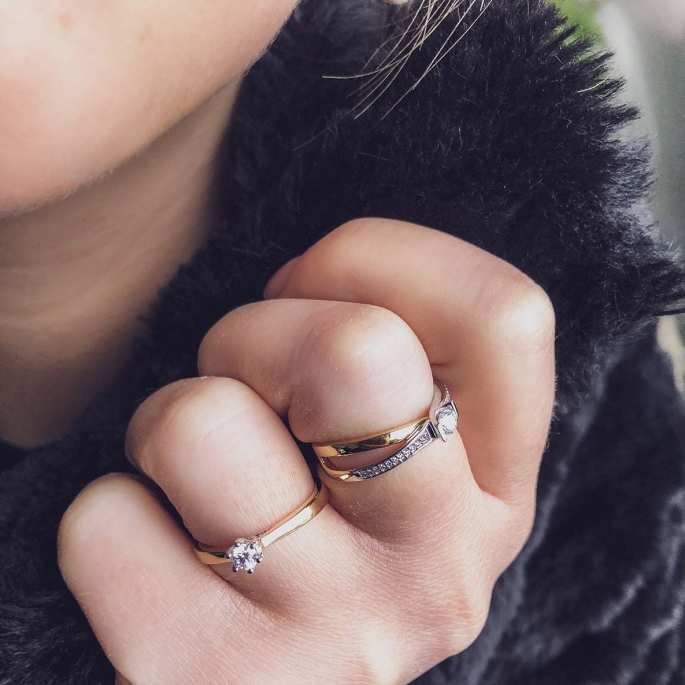 Zeitloser Bicolor Damenring aus Gelb- und Weißgold mit 0,14 ct Brillant-Diamant