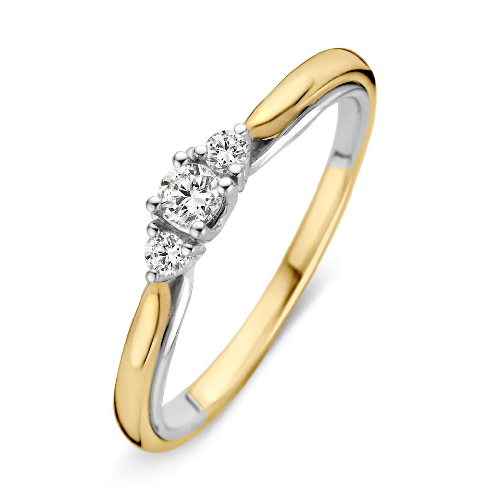 Bicolor Ring aus Gelb- und Weißgold mit drei Brillanten, insgesamt 0,19 ct.