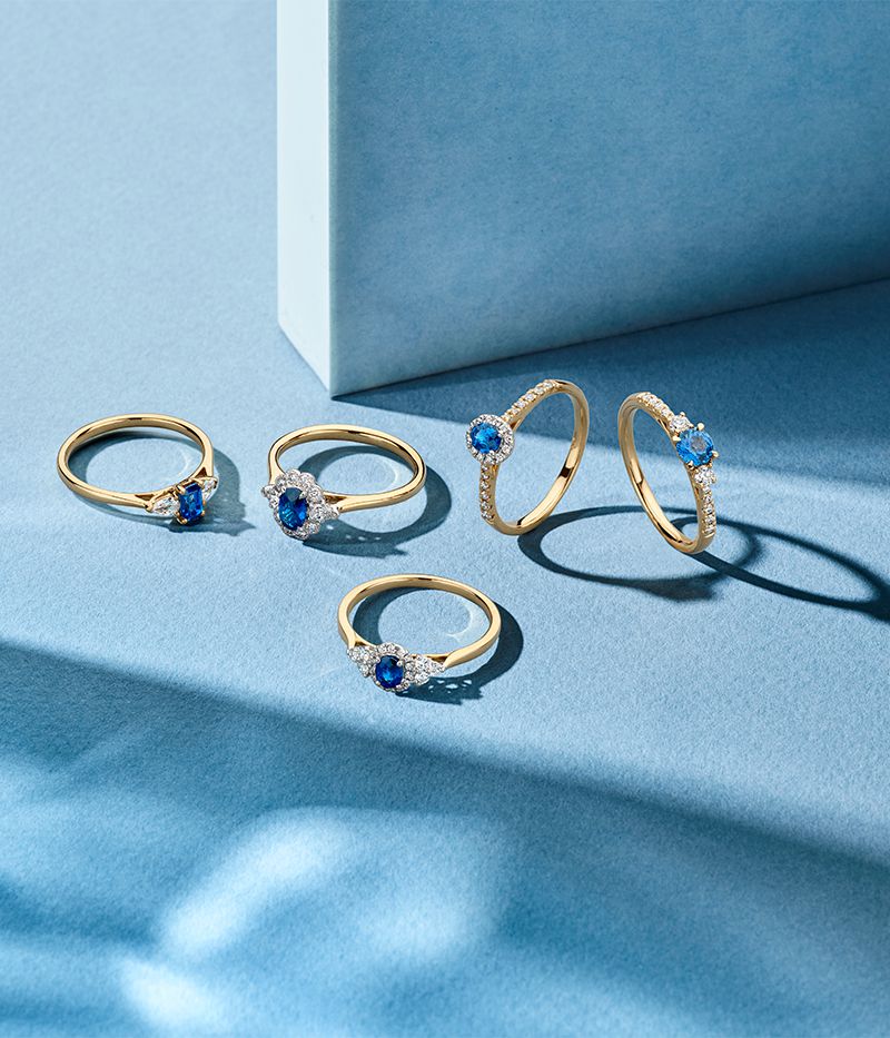 14-karätiger Bicolor-Gold-Damenring mit blauem ovalem Saphir und Diamant-Halo