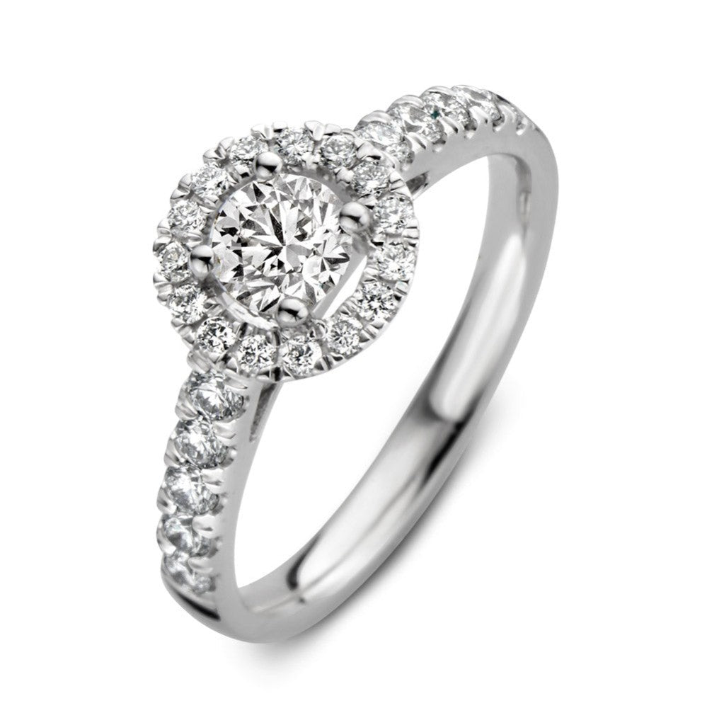 Ring aus Weißgold mit rundem Zifferblatt, besetzt mit einem großen Diamanten und kleinen Brillanten