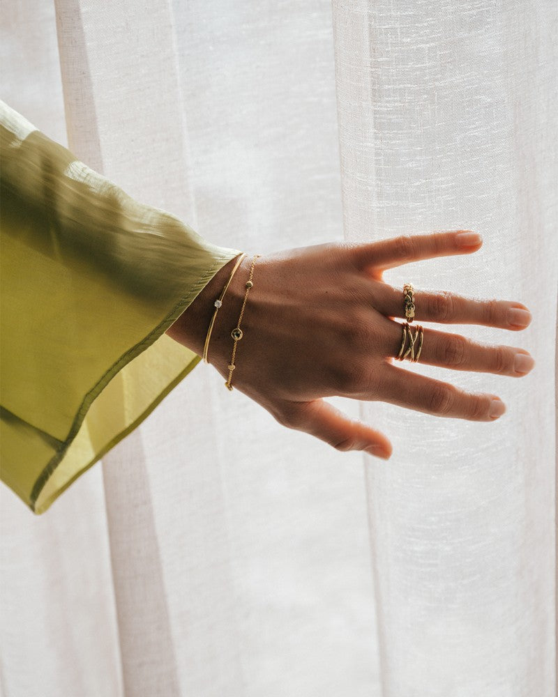Geelgouden Ring met Verschillende Gouden Banen – 14-Karaat Luxe voor Dames