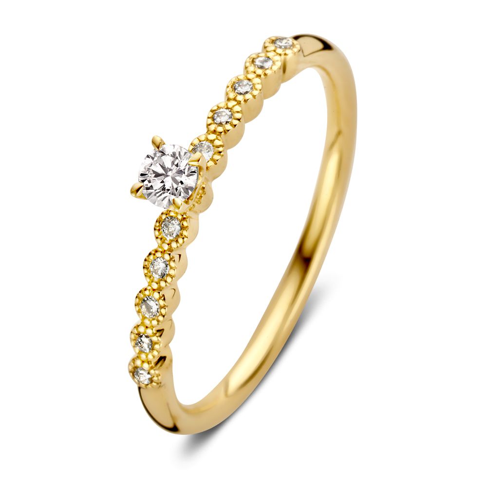 Vintage Ring aus 14 Karat Gelbgold mit einem Brillanten und seitlichen Diamanten