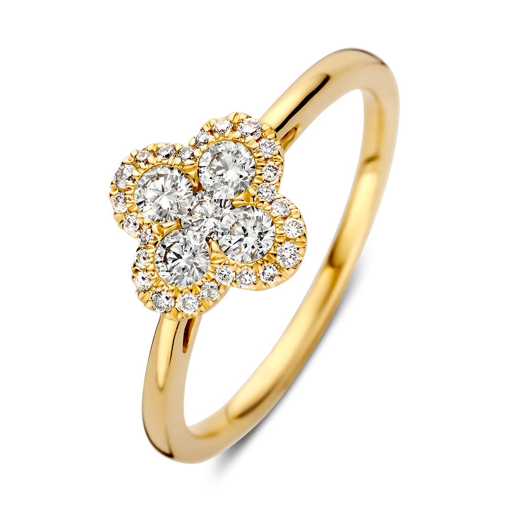 Ring aus Gelbgold mit Brillanten, drei Hauptsteinen und umlaufendem Pavé