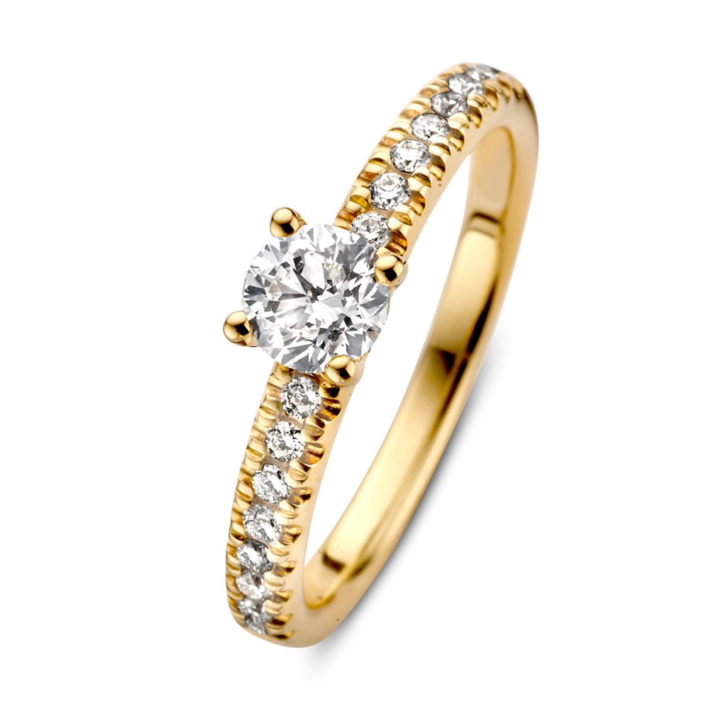 Gelbgoldene Solitär-Ring mit brillantem Diamanten und kleinen seitlichen Steinen