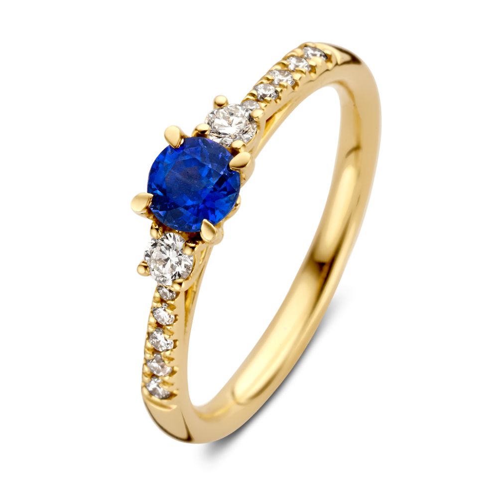 Eleganter Ring aus Gelbgold mit blauem Saphir und Brillanten an der Fassung