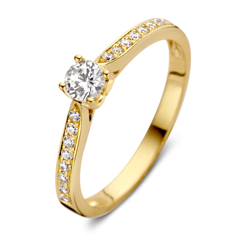 Ring aus 14-karätigem Gelbgold mit einem großen Edelstein und kleinen Zirkonia entlang des Schenkels
