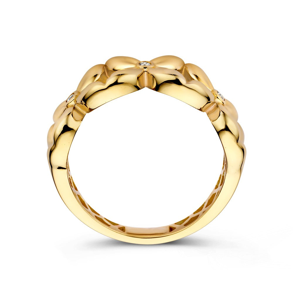 Breiter Gelbgoldring mit Blumenmuster und Zirkonia-Herz – Eine feminine Note