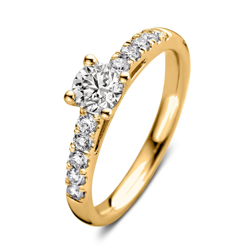 Ring aus Gelbgold mit rundem Zirkonia und kleinen Zirkonia an der Seite