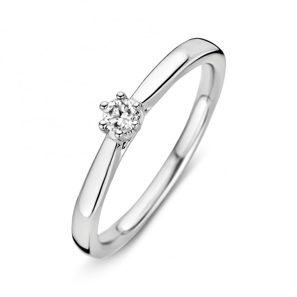 Ring aus Weißgold mit einem kleinen Diamanten, schlichte und zeitlose Form
