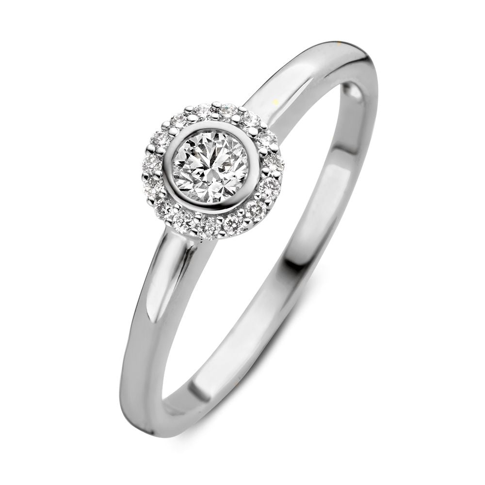 Ring aus Weißgold mit rundem Brillanten und kleinerem, funkelndem Steinbesatz
