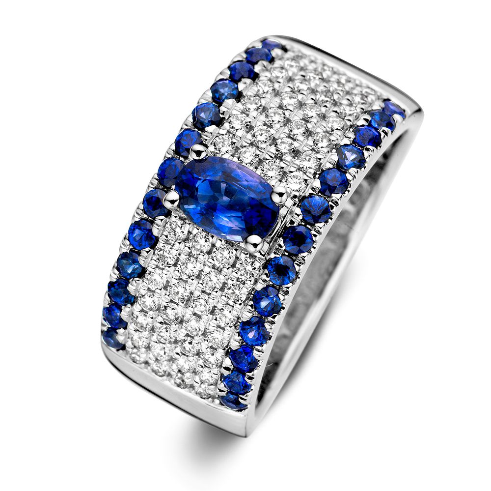 Luxe Ring aus 14 Karat Weißgold mit ovalem Saphir und Diamanten, besetzt mit blauen und weißen Steinen