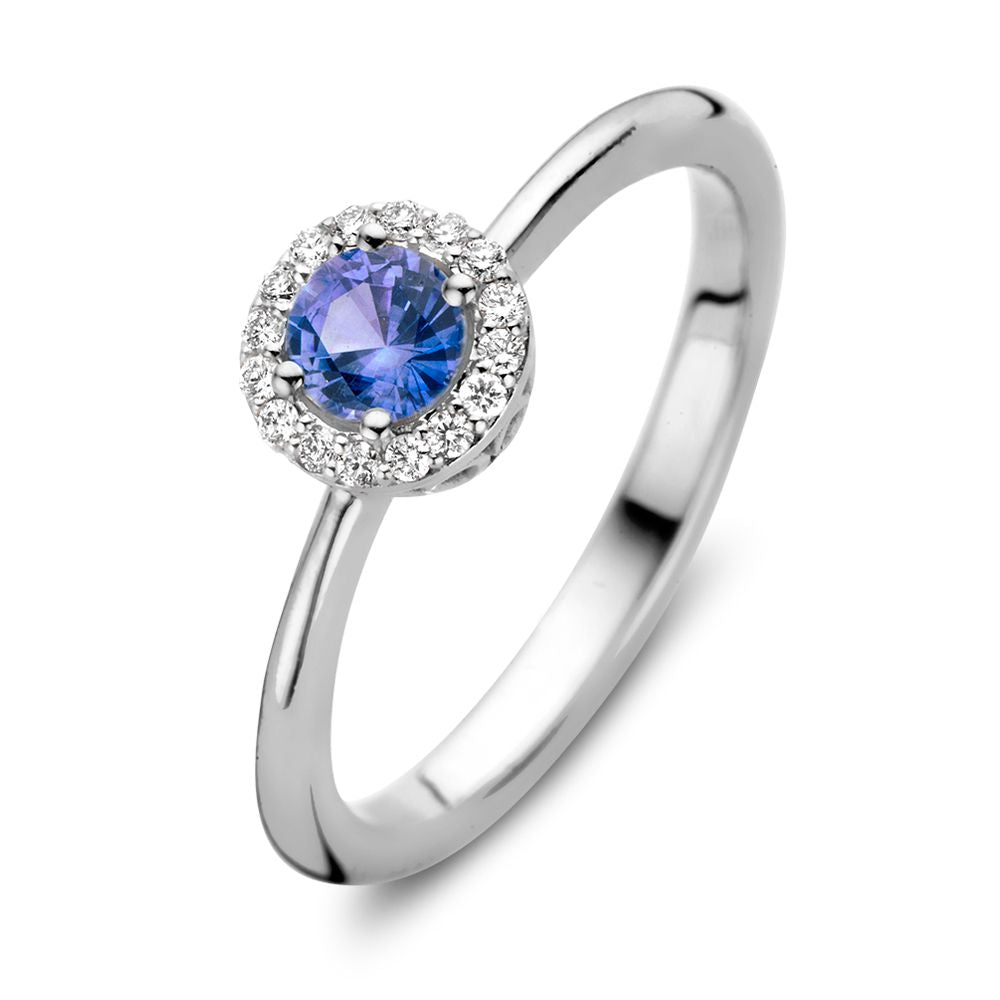 18kt Weißgold Entourage Ring mit blauem Saphir und 0,11 ct Diamanten in runder Form