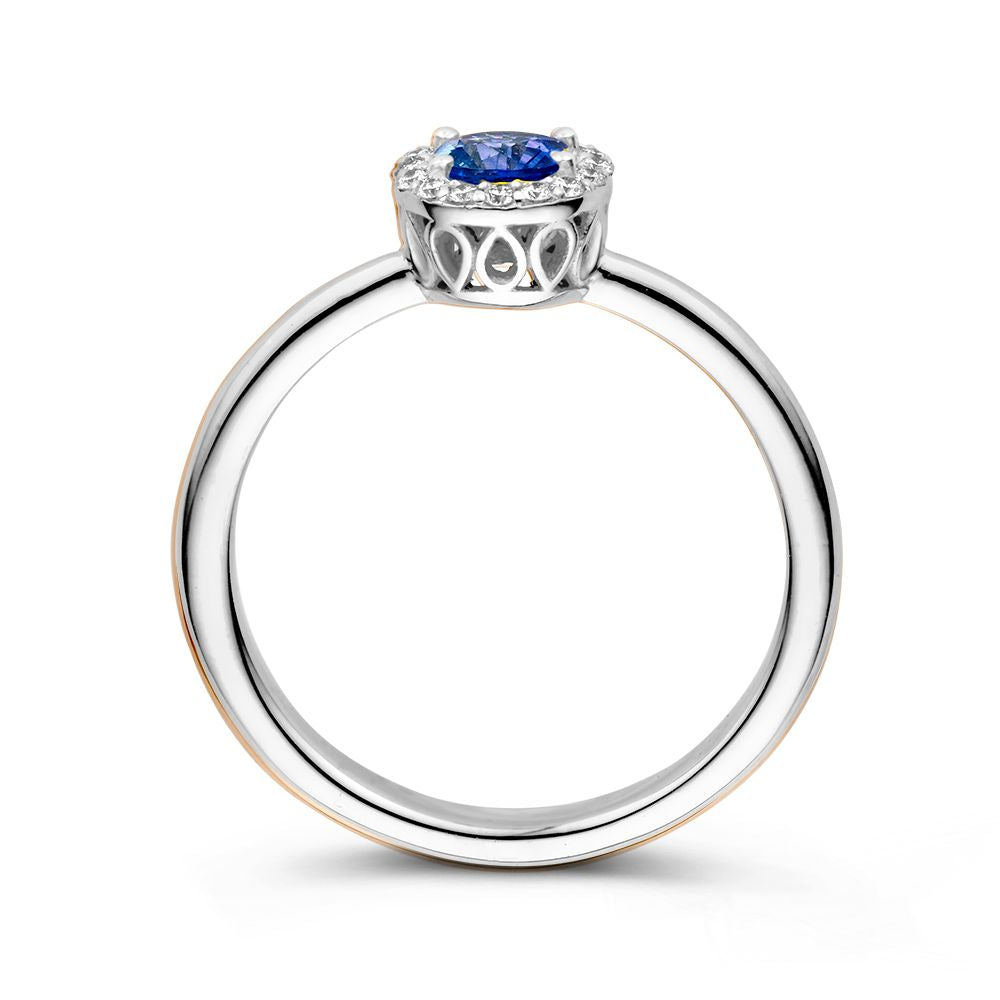 18kt Weißgold-Entourage-Ring mit blauem Saphir und 0,11ct Diamanten
