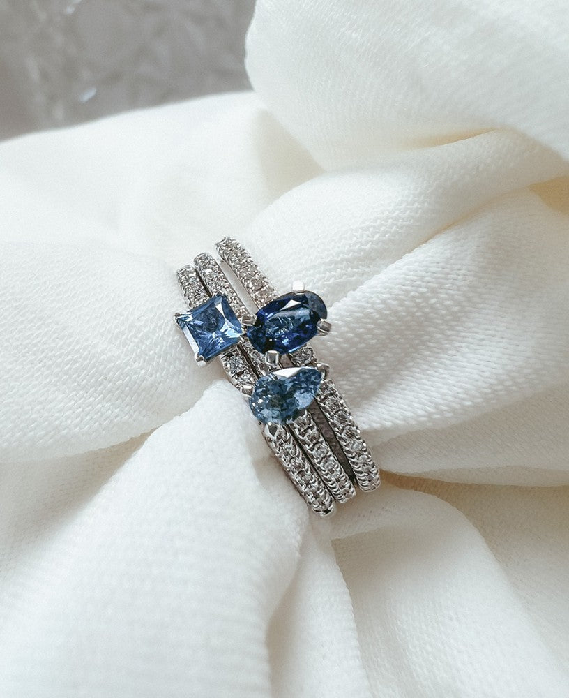 14 Karat Weißgoldring mit Saphir im Princess-Schliff und 0,10 Karat Diamanten