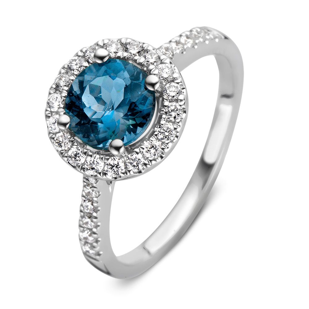 Ring aus Weißgold mit ovalem London Blue Topas und Diamanten rundherum
