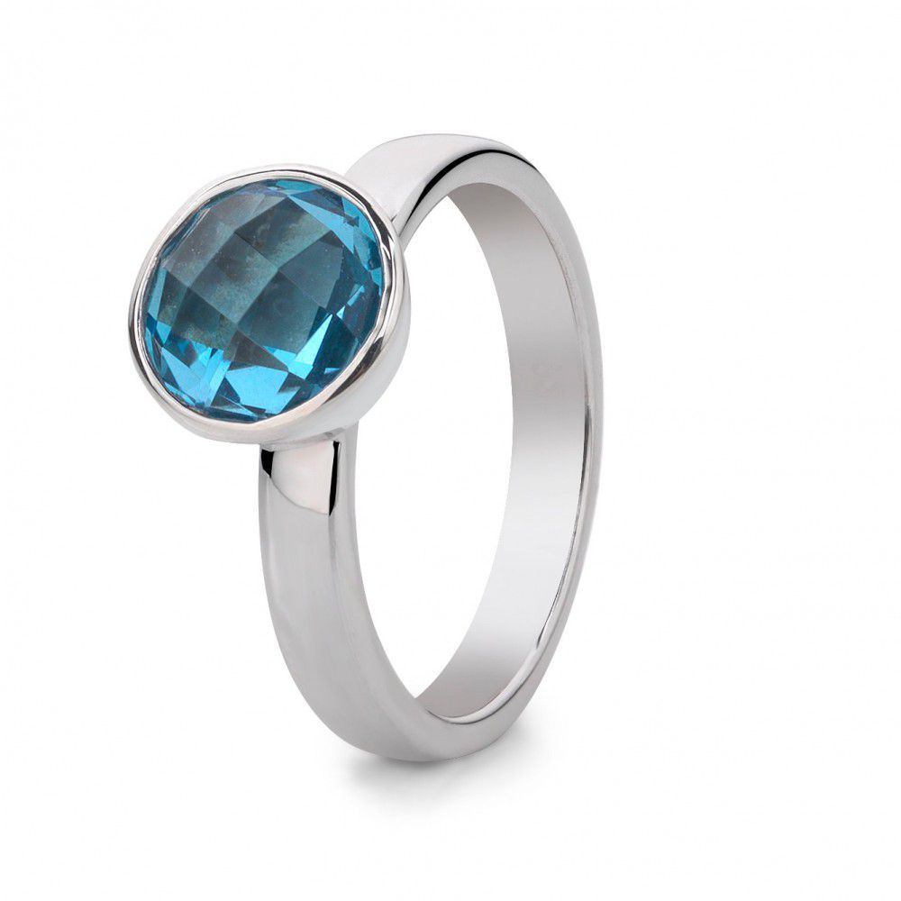 Ring aus rhodiniertem Silber mit facettiertem, blauem Topas