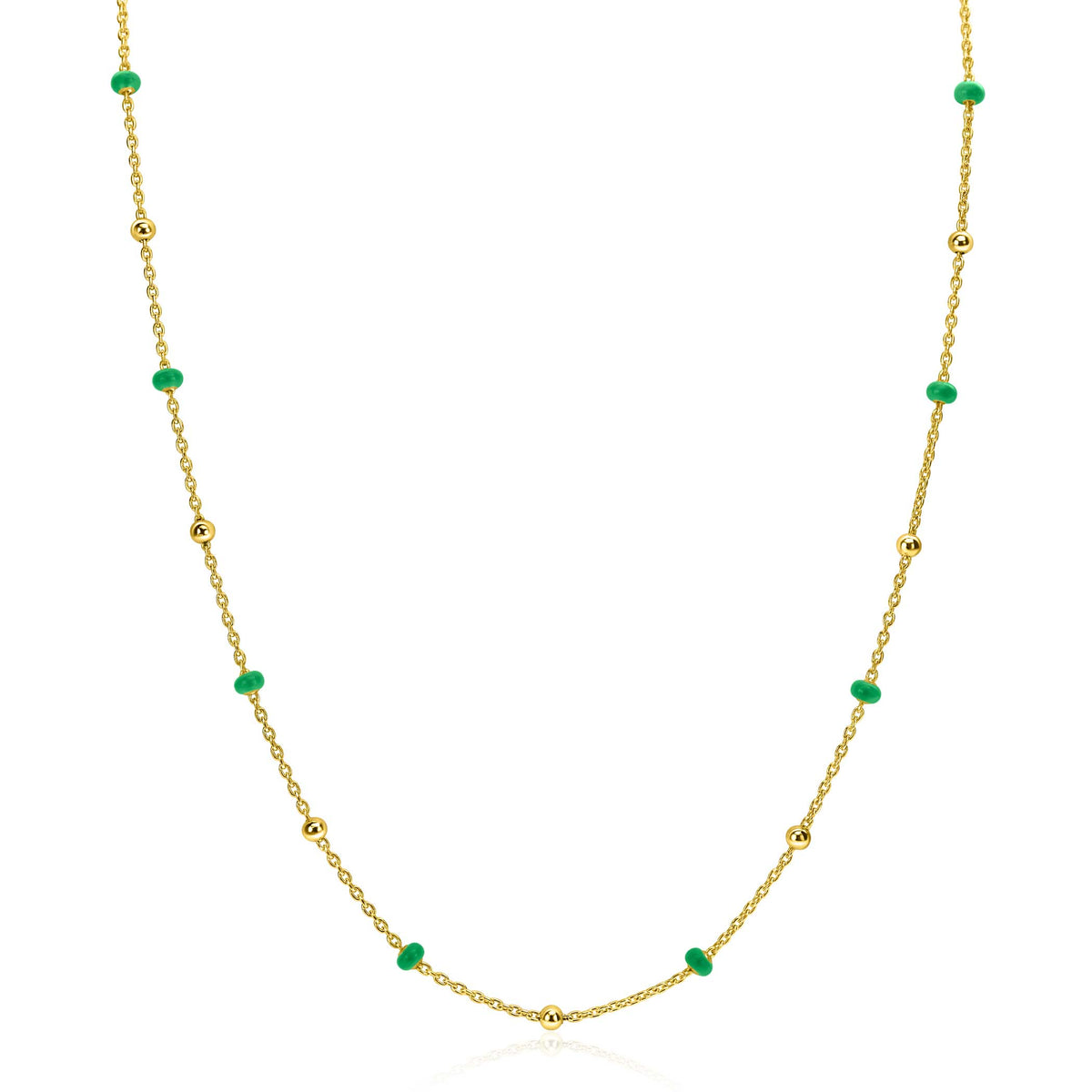 Halskette mit goldplattiertem Design und grünen Perlen in verschiedenen Abständen