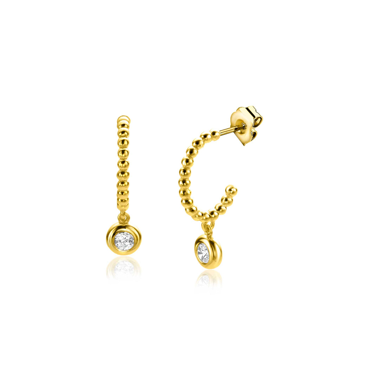 Goldene Ohrringe mit kleinen Kugeln und einem klaren Edelstein in der Mitte