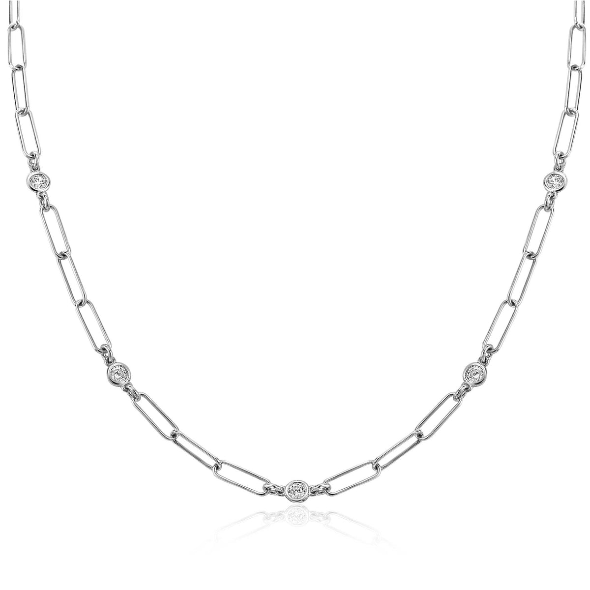 Kette aus Silber mit ovalen Gliedern und runden Edelsteinen in Abständen