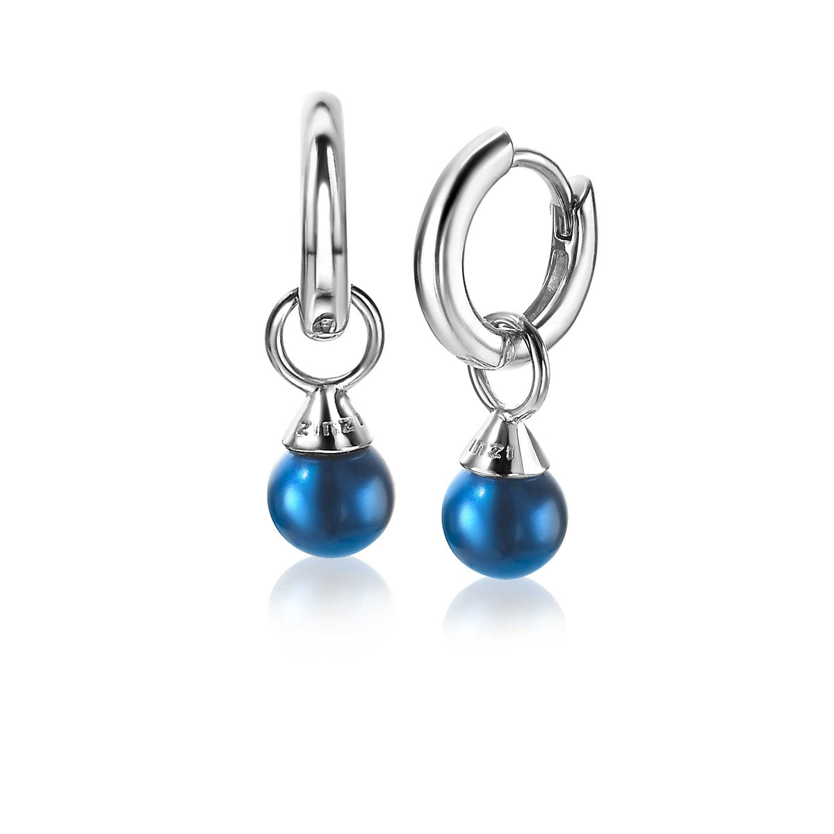 Silberne Ohrringe mit blauen Perlen und einem modernen Design