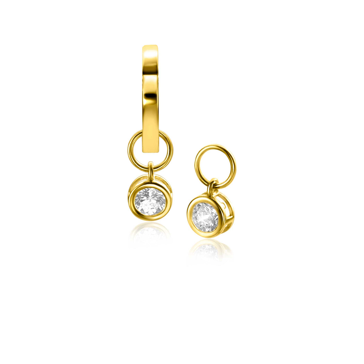 Ohrringe aus Gold mit einem klaren Edelstein, hängend an einem runden Ring