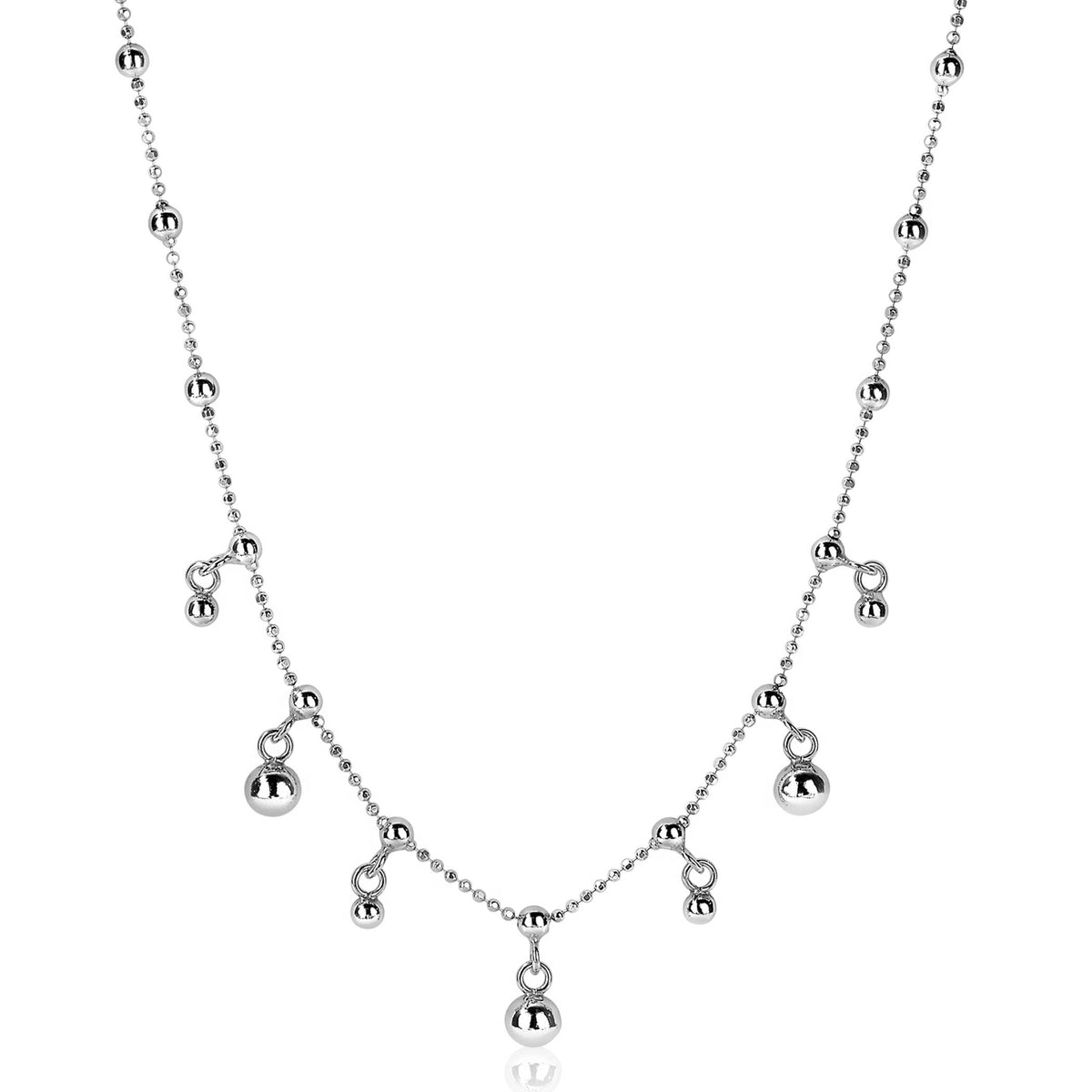 Kette aus Silber mit runden, glänzenden Anhängern in verschiedenen Größen