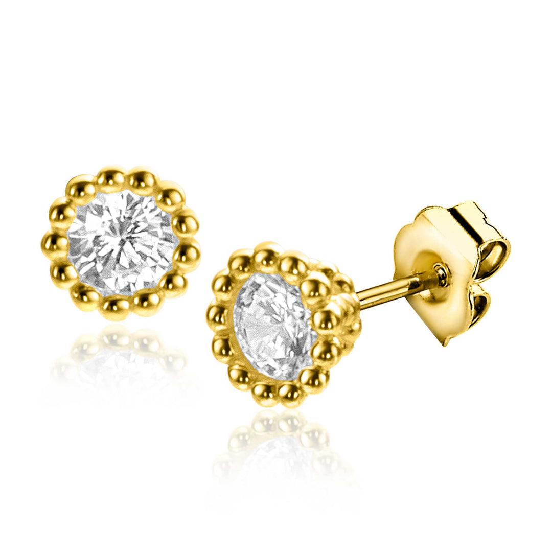 Ontdek de elegantie van Zinzi Oorbellen Goud Zgo319 van Zinzi. Deze gouden oorbellen hebben een ronde diamant in het midden met een kralenrand en hartvormige achterkanten. Geraffineerd en tijdloos, ze zijn ideaal voor elke gelegenheid.