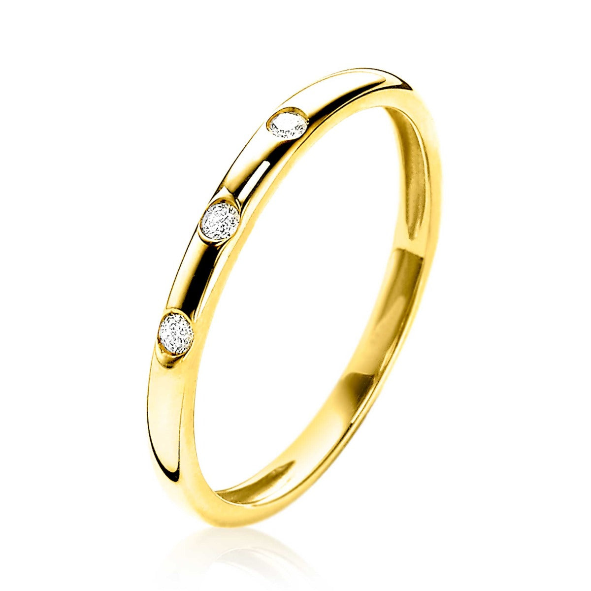Ring aus Gold mit drei kleinen, funkelnden Edelsteinen