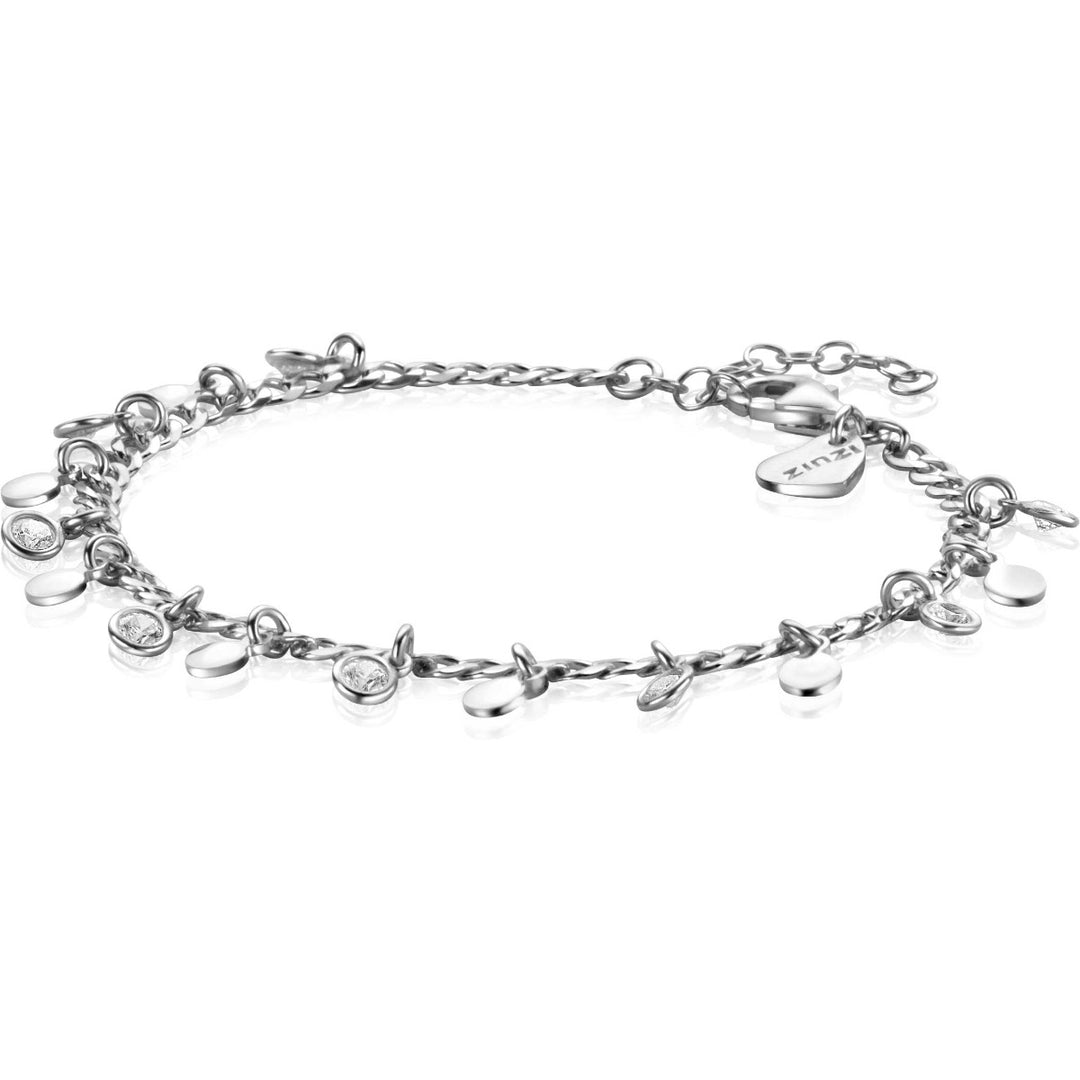 De Zinzi Armband Zilver Zia2349 is een delicate zilveren bedelarmband met ronde hangers en een hartvormige sluiting, geaccentueerd door sprankelende witte zirkonia op een ongerepte witte achtergrond. Dit elegante accessoire past moeiteloos tussen 17-20 cm voor de perfecte pasvorm.